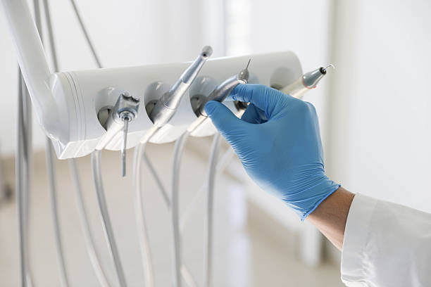 Professional Tooth Extraction technician working in Salem, IN